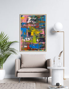 obra de arte abstracta de colores sobre sillón nórdico